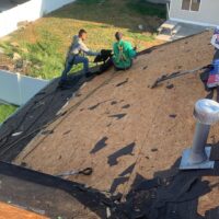 Legacy Roofing helping a homeowner with an insurance claim roof replacement in Utah.